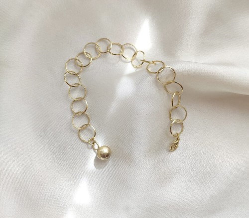 złota bransoletka koła